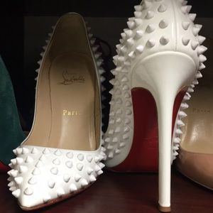 Authentic Christian louboutin white spiked heels.